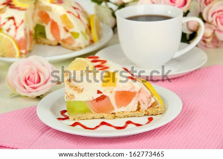 Delicious jelly cake on table close-up