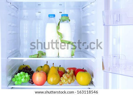 Conceptual photo of diet: healthy food in refrigerator
