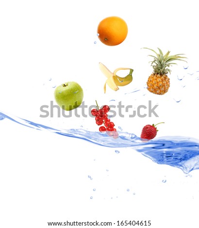 Fresh fruits dropped into water