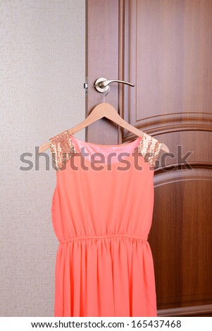 Dress hanging on door