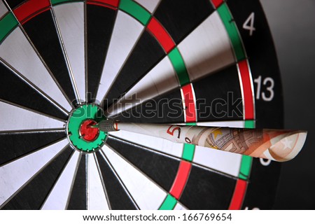 Money dart and target close up. Concept of success.