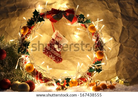 Beautiful Christmas wreath, on old paper background