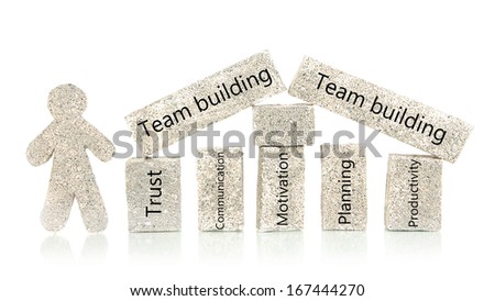 Team building blocks with little man isolated on white