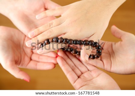 Muslim praying hands on light background