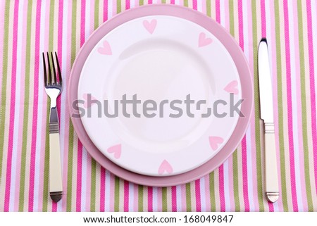 Set of utensil for dinner, on napkin, close up
