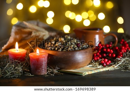 Bowl with kutia -  traditional Christmas sweet meal in Ukraine, Belarus and Poland, on wooden table, on bright background