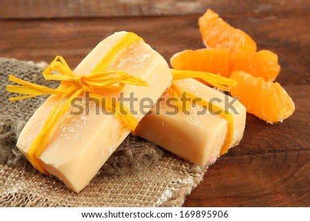 Natural fruit handmade soap, on wooden background