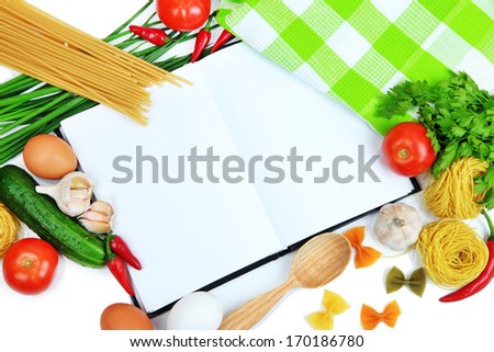 Cooking concept. Groceries with empty cookbook close up