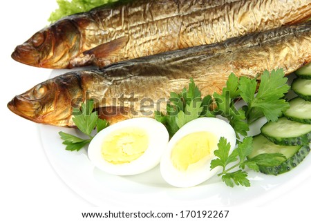 Smoked fish on plate close up