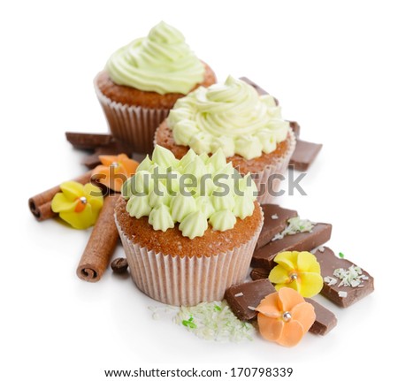 Tasty cupcakes with butter cream, isolated on white