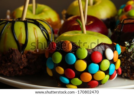 Candied apples on sticks close up