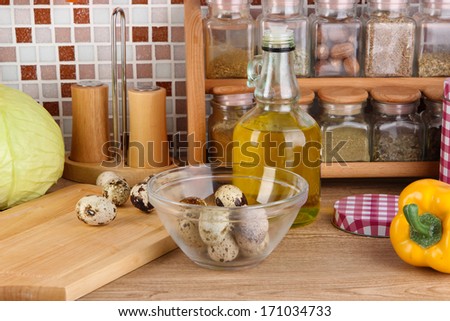 Cooking food in kitchen on table on mosaic tiles background