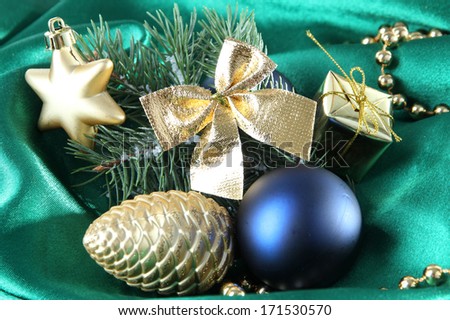 Beautiful Christmas decor on green satin cloth