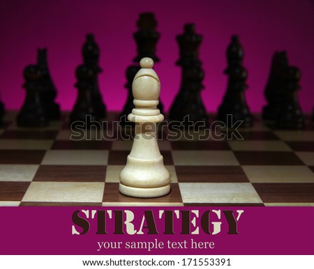 Chess board with chess pieces on dark color background