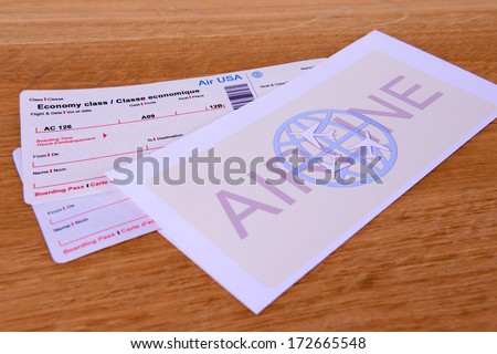 Airline tickets on table close-up