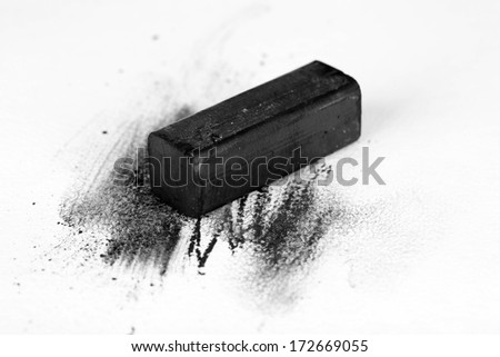 Black drawing charcoal isolated on white