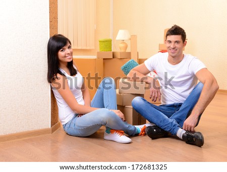 Young Couple Moves Into New Home