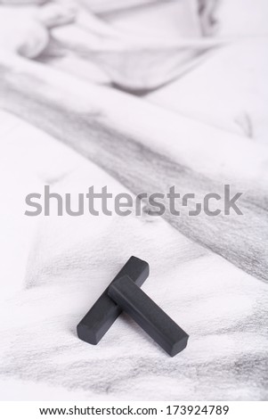 Black drawing charcoal on  picture isolated on white