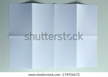 Folded white sheet of paper close up