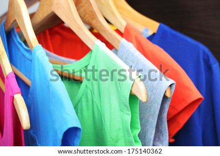 Clothes on circle hanger on dark background
