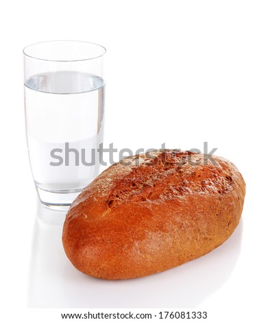 Rye bread and glass of water isolated on white