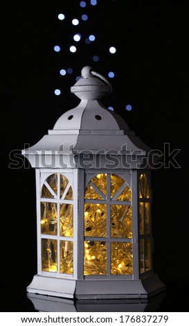 Decorative glowing lantern at night