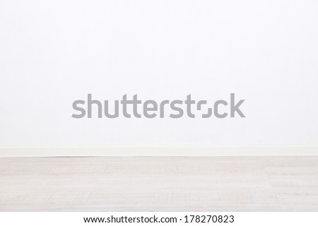 Empty room with wall and wooden floor