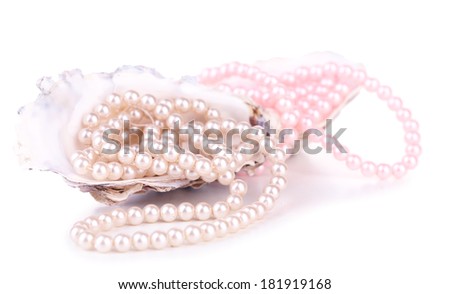 Shells with pearls, isolated on white