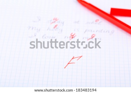 Grade written on an exam paper, close-up