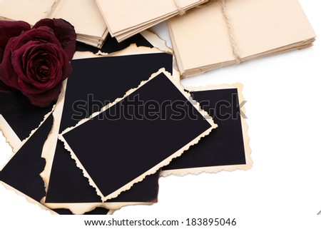 Blank old photos, letters and dried flower, isolated on white