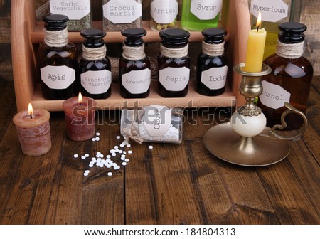 Historic old pharmacy bottles with label   on wooden background
