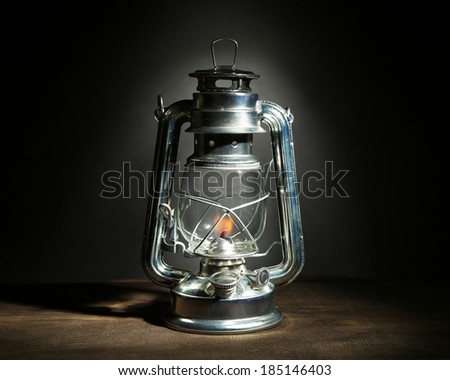 Kerosene lamp on dark grey background