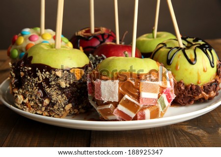 Candied apples on sticks close up