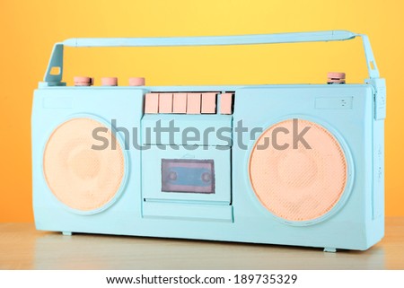 Colorful retro radio, on yellow background