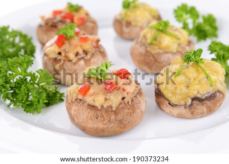 Stuffed mushrooms on plate close-up