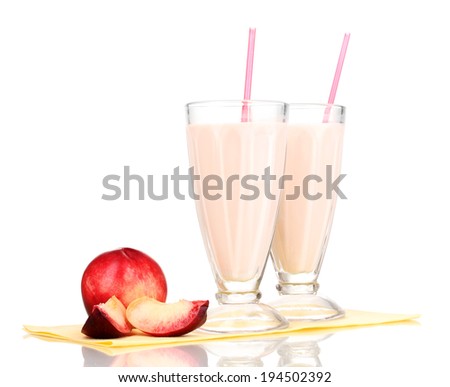 Peach milk shakes isolated on white