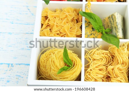 Italian pasta in wooden box close-up