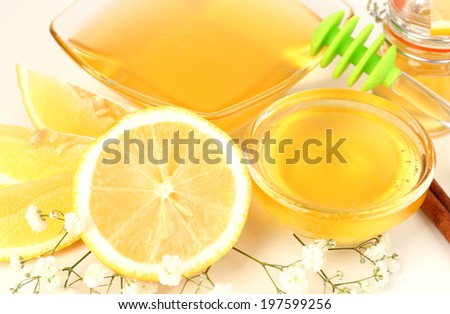 Sweet honey with lemon close up
