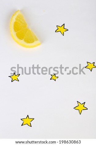Beautiful still life composition with lemon slice. Food art concept. Isolated on white