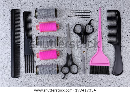 Professional hairdresser tools  on gray background