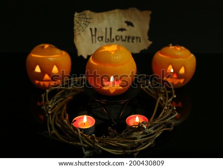 Festive composition with lanterns and candles isolated on black