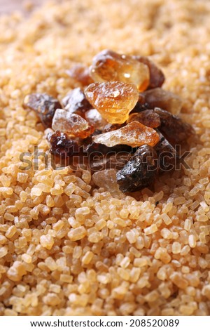 Reed sugar on brown crystal sugar background