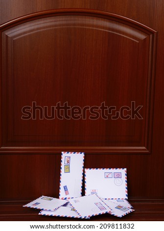 Letters on floor at front door