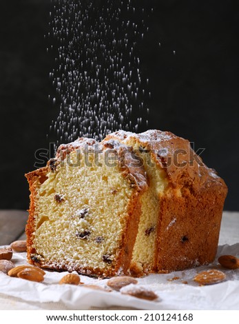 Tasty cake on table on grey background