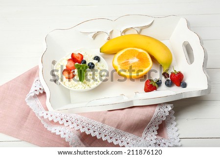 Delicious breakfast with cottage cheese and fruits