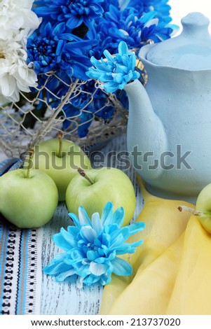 Composition of white and blue chrysanthemum close-up