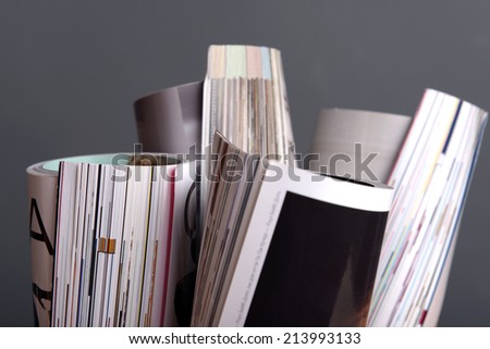 Magazines on gray background