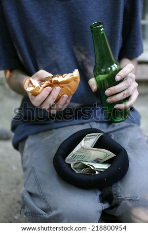 Homeless beggar food and money
