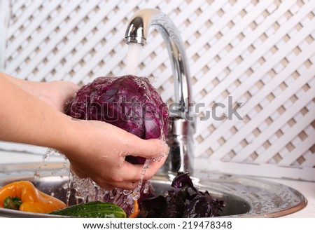 Washing vegetables, close-up