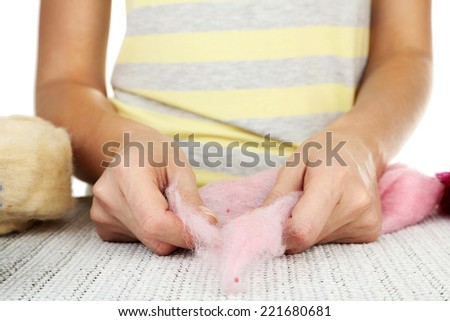 Woman working with wool close up